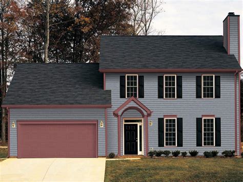 metal roof on gray house|gray siding black windows.